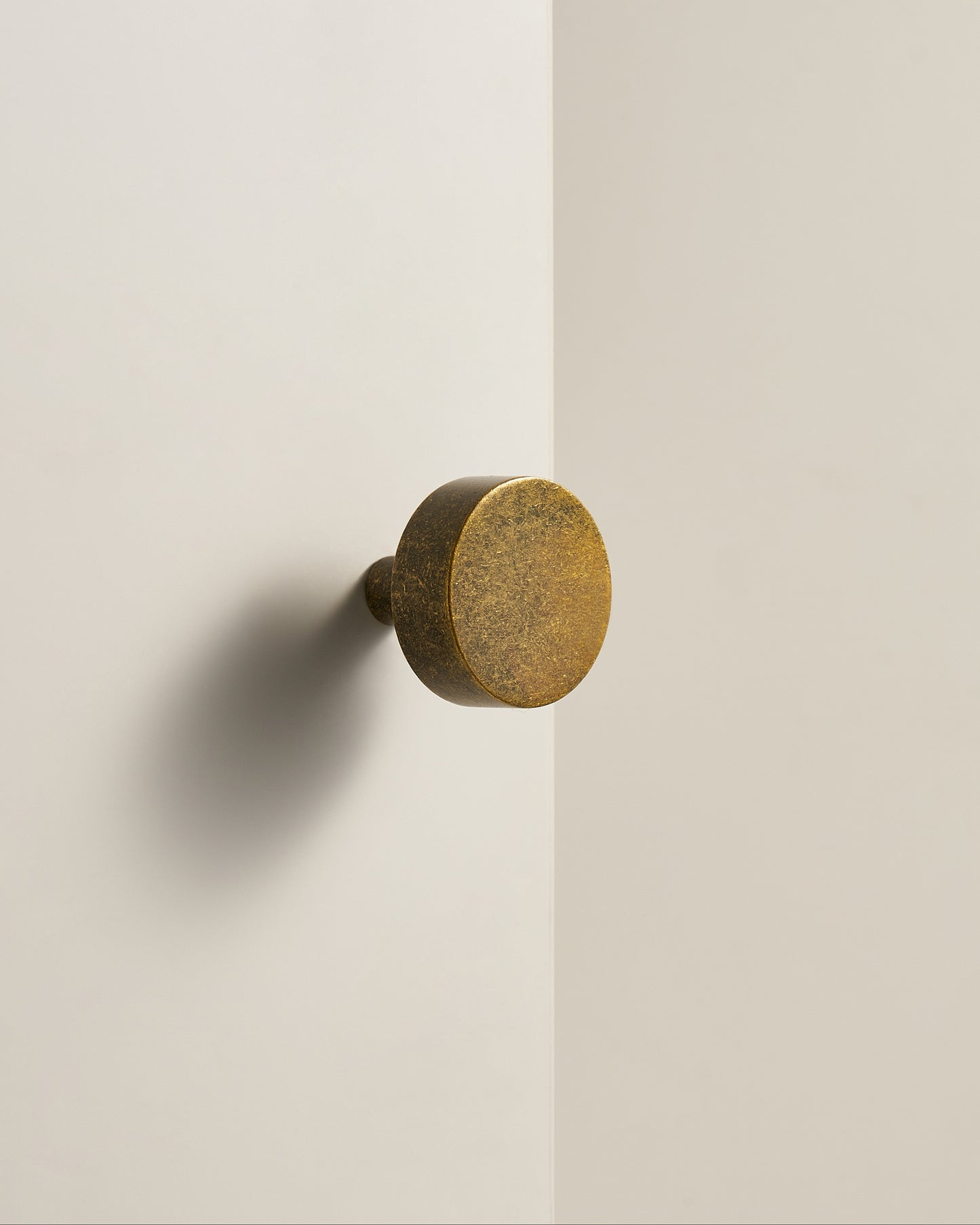 DUMHAM ROUND CABINET PULL IN ANTIQUE PATINA