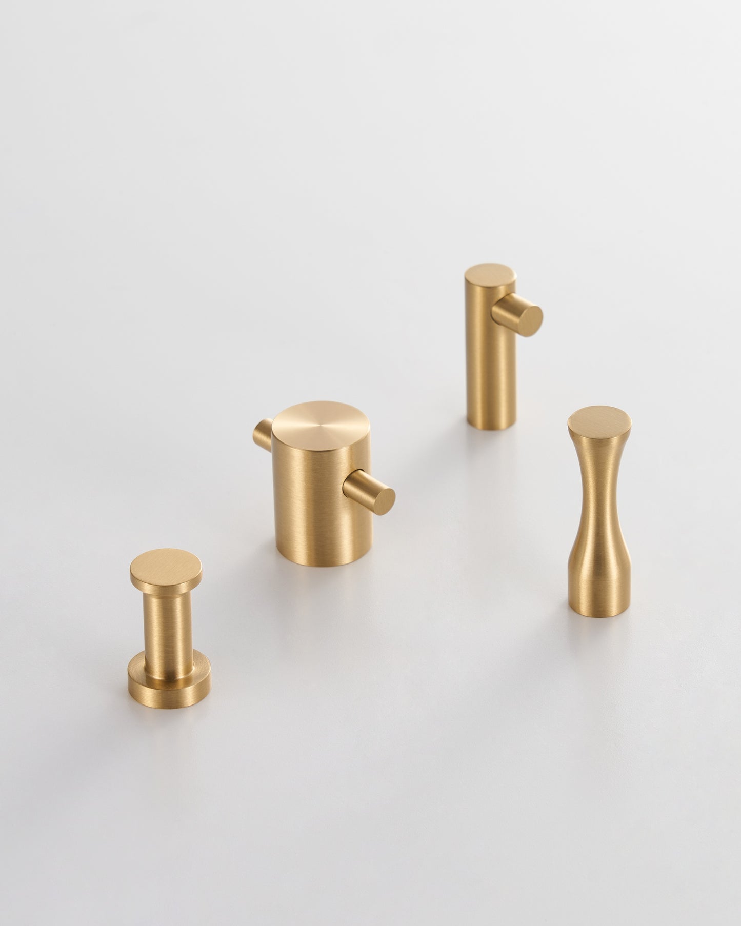 MONACO DECORATIVE HOOKS IN BRUSHED BRASS