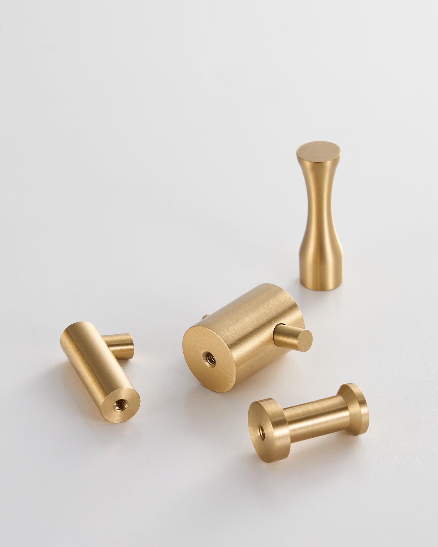 MONACO DECORATIVE HOOKS IN BRUSHED BRASS